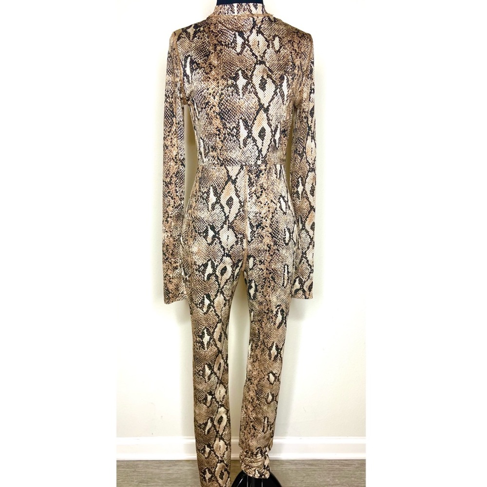 Nothing like animal print! A classy one piece perfect for Dinner and night life